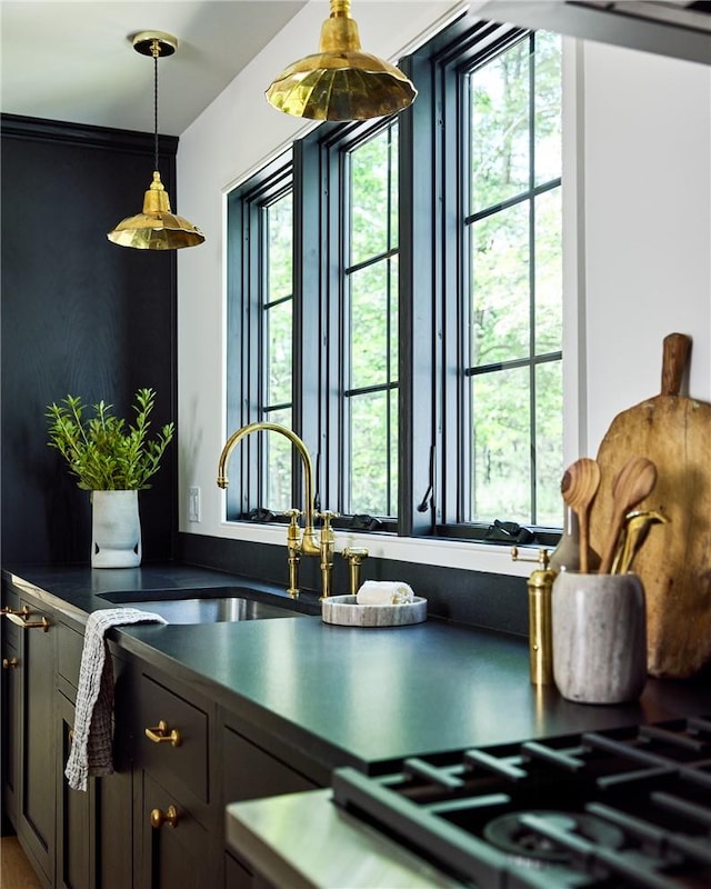 room details featuring stainless steel gas cooktop and sink