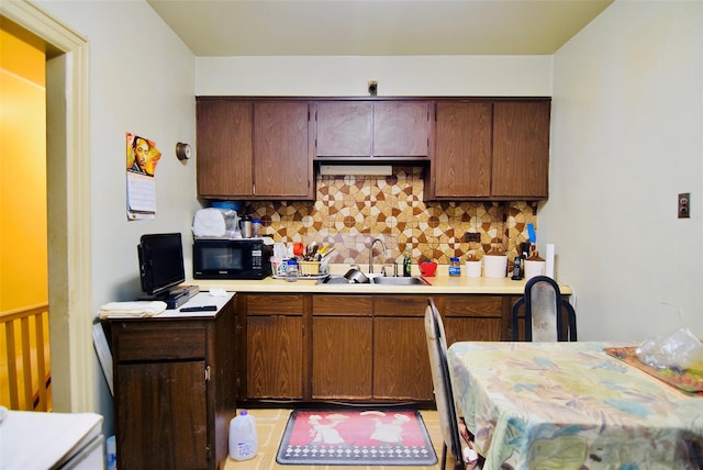 kitchen with sink and backsplash