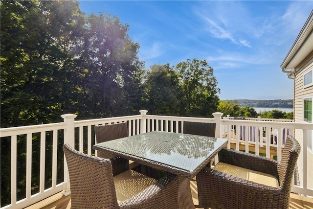 wooden terrace with a water view