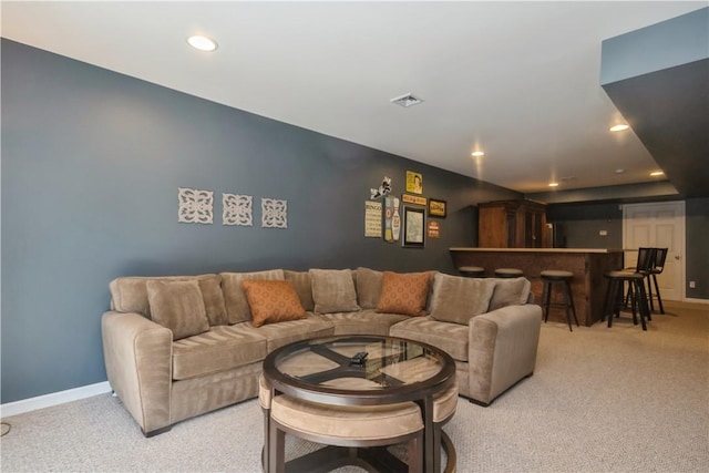 living room featuring light carpet