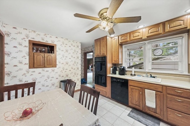 kitchen with ceiling fan, sink, light tile patterned floors, and black appliances