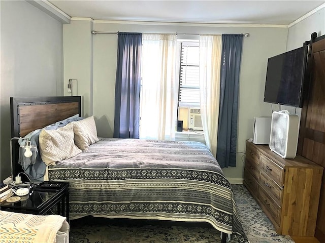 bedroom with ornamental molding