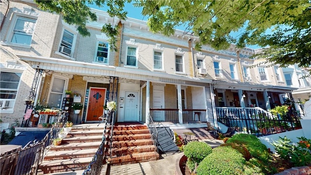 view of property with covered porch