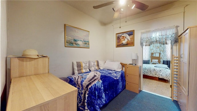 carpeted bedroom with ceiling fan