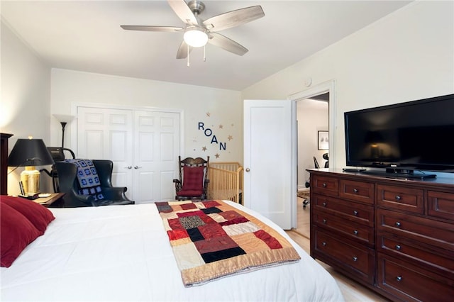 bedroom featuring ceiling fan and a closet