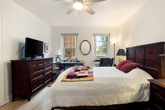 bedroom featuring ceiling fan and light hardwood / wood-style floors