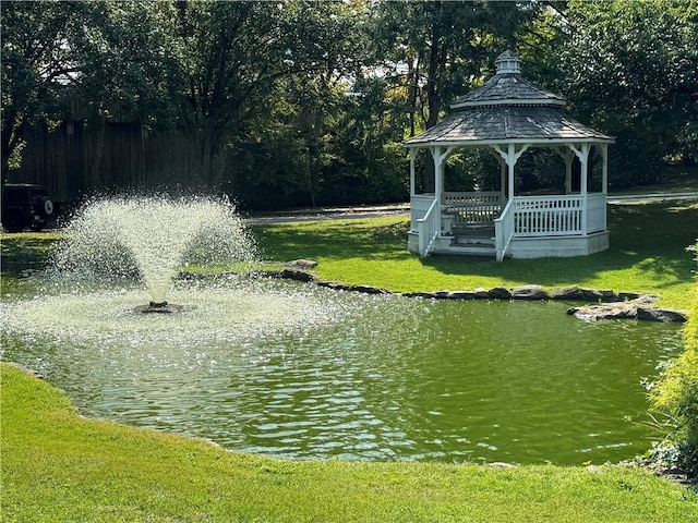 property view of water with a gazebo