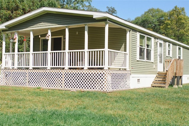 view of front of property with a porch and a front yard