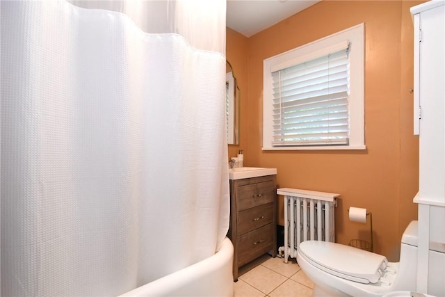 full bathroom featuring shower / bath combo, tile patterned floors, vanity, radiator heating unit, and toilet