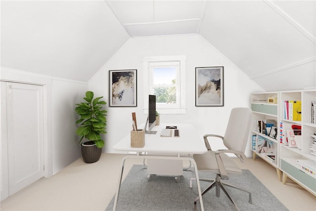 home office with light carpet and vaulted ceiling