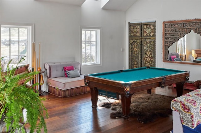 recreation room with hardwood / wood-style flooring, plenty of natural light, lofted ceiling, and pool table