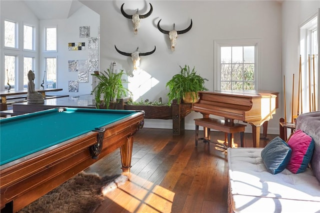 rec room featuring a wealth of natural light, dark hardwood / wood-style floors, and pool table