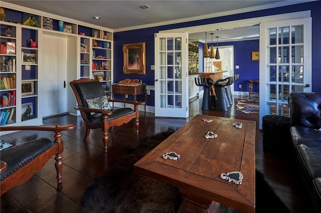 office area with dark hardwood / wood-style flooring, ornamental molding, and french doors