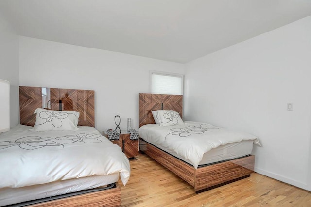 bedroom featuring light hardwood / wood-style floors