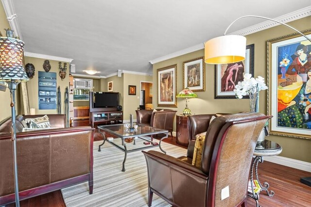 2575 Palisade Ave Unit 2G, Bronx, NY 10463 - living area featuring baseboards, ornamental molding, and wood finished floors