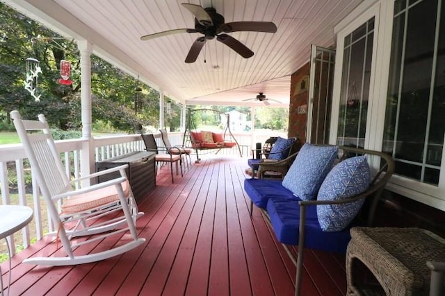 wooden terrace featuring covered porch