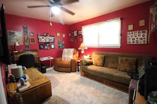 living room with ceiling fan and carpet floors