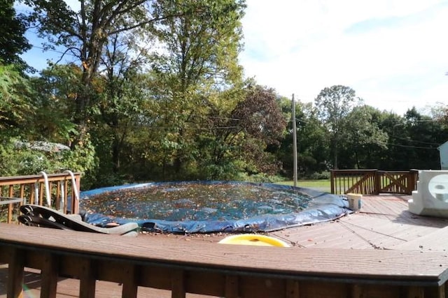 view of pool with a deck