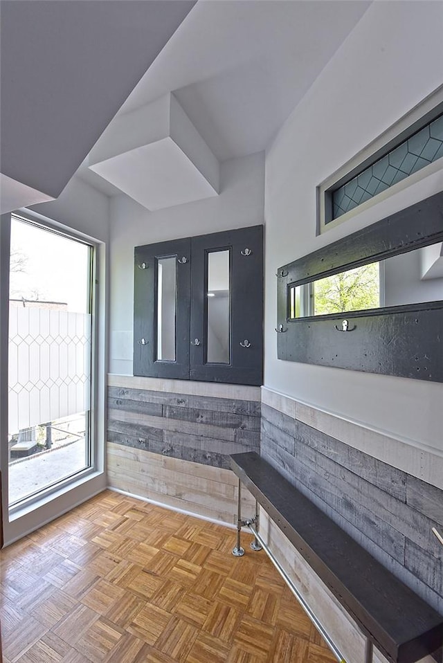 interior space featuring parquet floors and a wealth of natural light