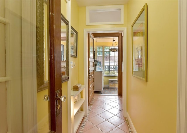 hallway featuring light tile patterned flooring