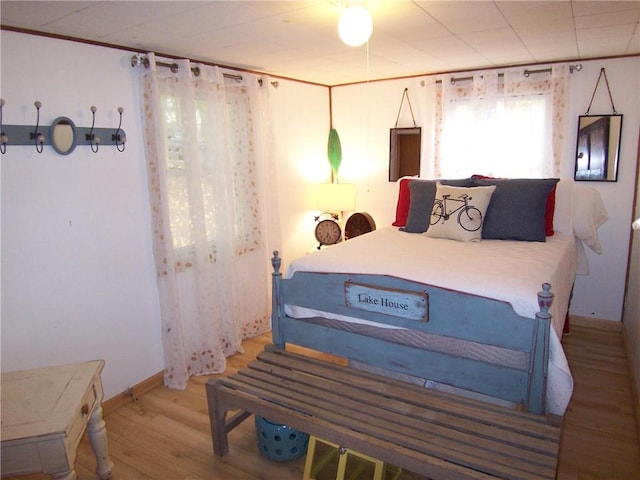 bedroom featuring hardwood / wood-style floors