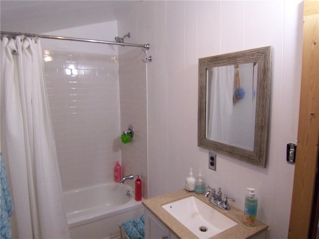 bathroom featuring shower / tub combo with curtain and vanity