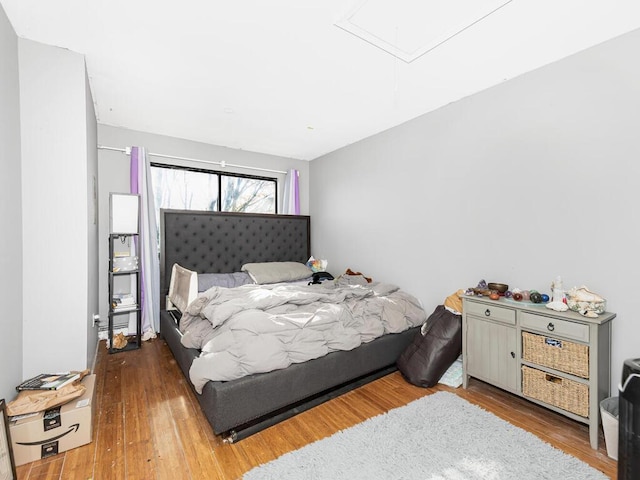 bedroom with wood-type flooring