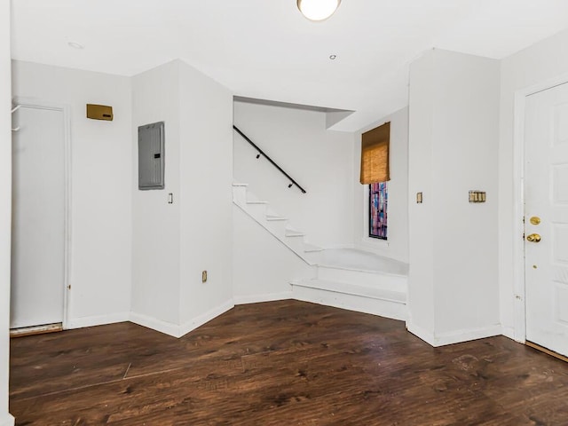 entryway with electric panel and dark hardwood / wood-style floors