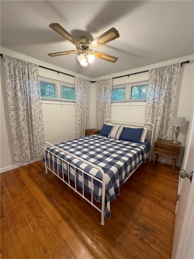 bedroom featuring ceiling fan and wood-type flooring