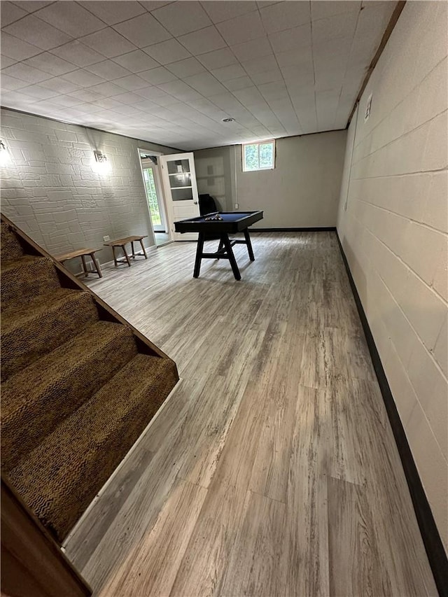 rec room with hardwood / wood-style floors