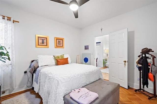 bedroom featuring ceiling fan and light parquet flooring