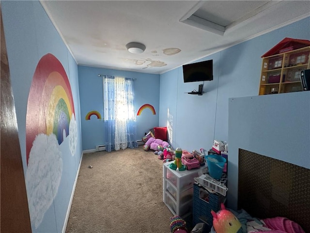 recreation room featuring carpet flooring, ornamental molding, and a baseboard heating unit