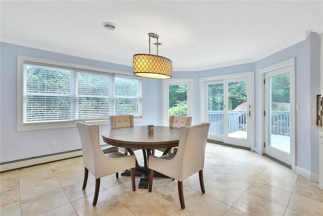 tiled dining room with a healthy amount of sunlight, crown molding, and baseboard heating