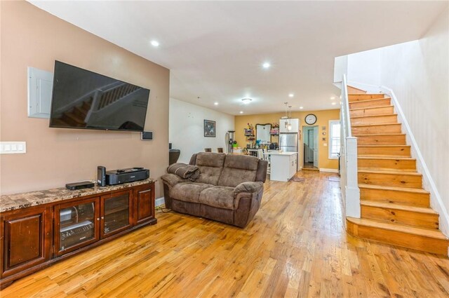 living room with light hardwood / wood-style floors