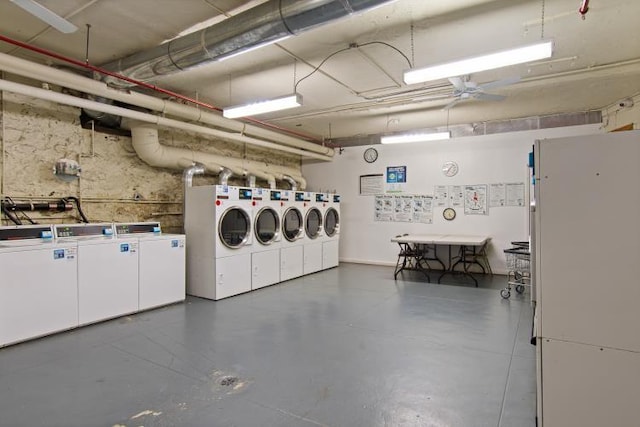 clothes washing area with ceiling fan and washing machine and clothes dryer