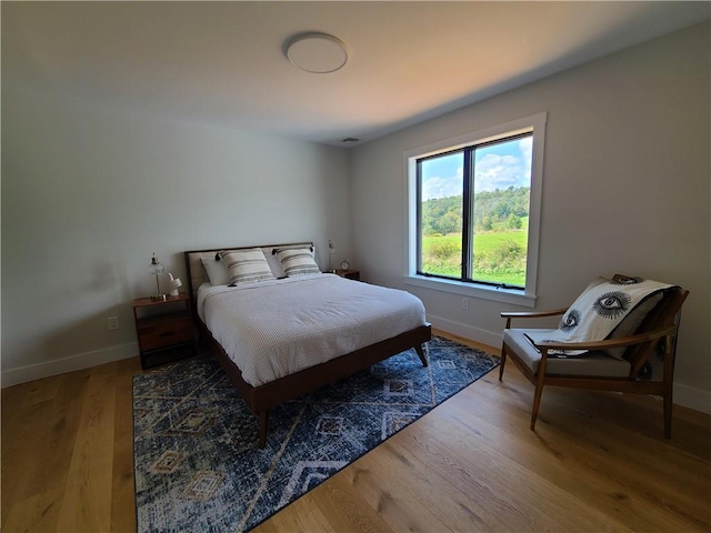 bedroom featuring hardwood / wood-style floors