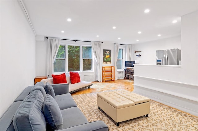 living room featuring radiator heating unit