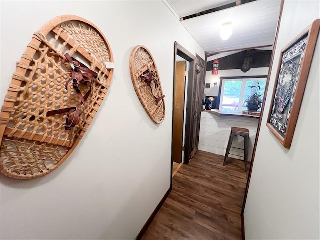 hall with dark hardwood / wood-style floors