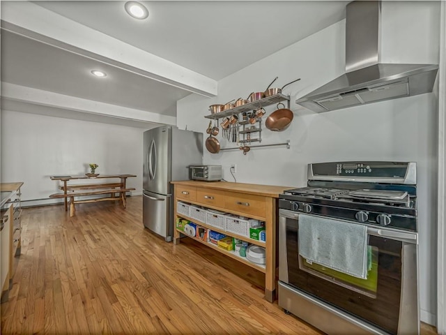 kitchen with beamed ceiling, wall chimney range hood, stainless steel appliances, and light hardwood / wood-style flooring