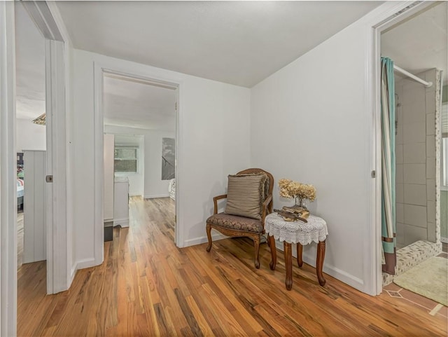 living area featuring light hardwood / wood-style floors