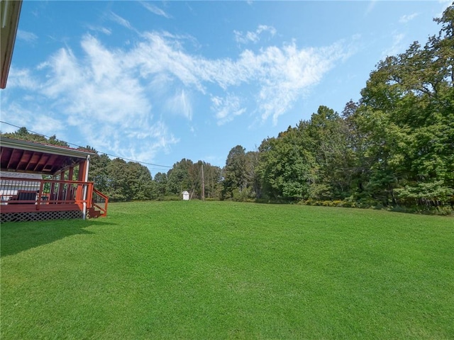 view of yard featuring a deck