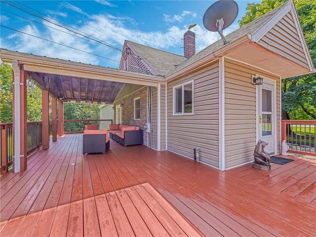 deck with an outdoor hangout area