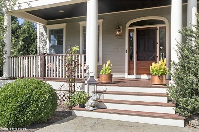 entrance to property with a porch