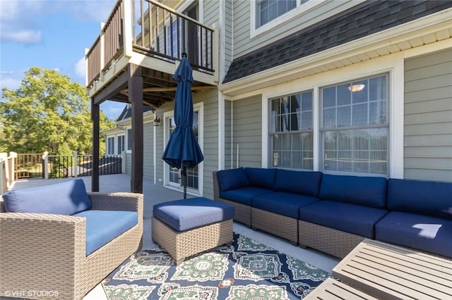 view of patio / terrace featuring an outdoor hangout area and a balcony