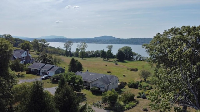 bird's eye view with a water and mountain view