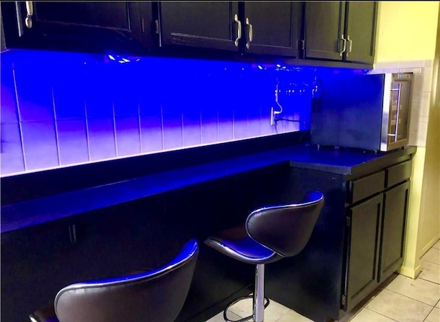 668 E 236th St, Bronx, NY 10466 - bar area with light tile patterned floors