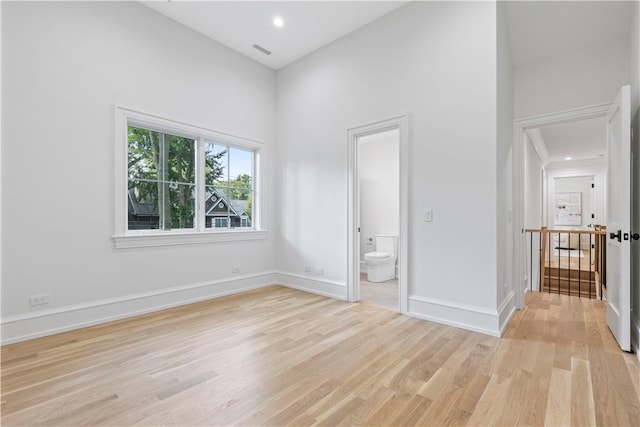 unfurnished room featuring light hardwood / wood-style flooring