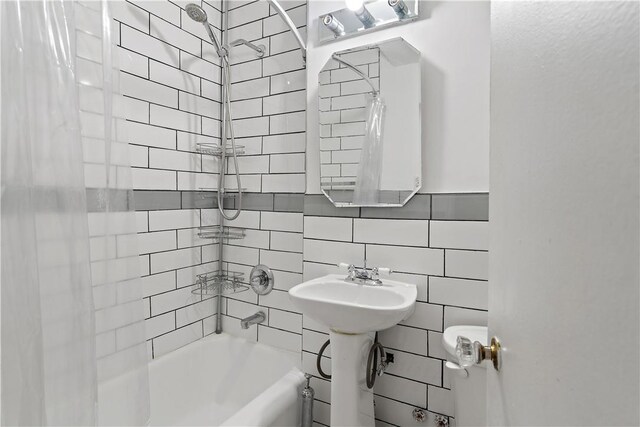 55A Ehrbar Ave Unit 2G, Mount Vernon, NY 10552 - full bath with shower / tub combo, tile walls, and decorative backsplash