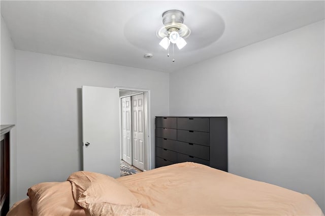 bedroom with a closet and ceiling fan