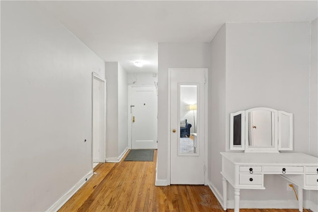 corridor featuring light wood-type flooring